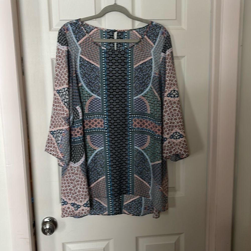 3/4 sleeve blouse in a patch work design in  a size XL